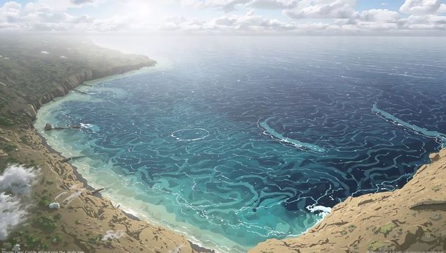 Sunlit turquoise bay showing swirling ocean foam from cliffside headland panorama