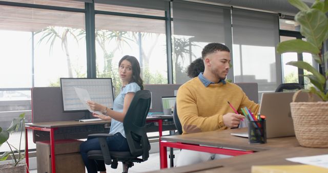 Colleagues Working Together in Modern Office with Natural Light - Download Free Stock Images Pikwizard.com