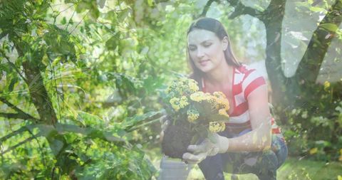 Joyful Woman Gardening with Love in Lush Greenery