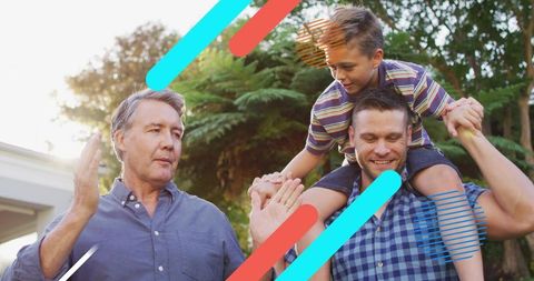 Multigenerational backyard bonding dad carrying son on shoulders grandpa giving high five
