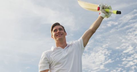 Cricket Player Celebrating Victory in Outdoor Match