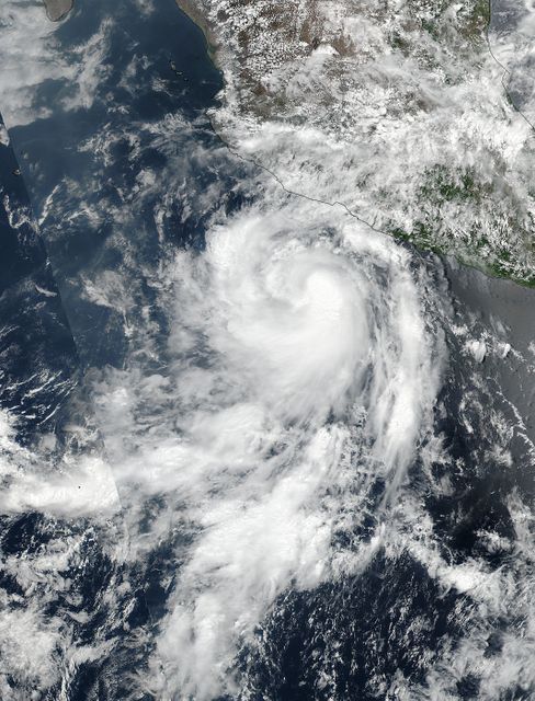 The fourth tropical cyclone of the Eastern Pacific Ocean season formed on June 25 and by June 26 it was already a hurricane. NASA-NOAA's Suomi NPP satellite passed over Dora on June 25 when it was a tropical storm and the next day it became the first hurricane of the season.    Tropical Depression Dora developed around 11 p.m. EDT on Saturday, June 24 about 180 miles (290 km) south of Acapulco, Mexico. By 5 a.m. EDT on June 25, the depression had strengthened into a tropical storm and was named Dora.  At 19:36 UTC (3:36 p.m. EDT), the Visible Infrared Imaging Radiometer Suite (VIIRS) instrument aboard NASA-NOAA's Suomi NPP satellite provided a visible-light image of the storm. The VIIRS imagery showed well-defined convective spiral bands of thunderstorms with a developing central dense overcast or CDO cloud feature.  Seven and a half hours later, Dora showed signs of better organization. At 11 p.m. EDT, the National Hurricane Center or NHC noted &quot;Dora's cloud pattern has continued to quickly improve this evening. Several well-defined spiral bands wrap around the center and the CDO has become more symmetric and expanded since the previous advisory.&quot;   At 5 a.m. EDT on Monday, June 26, Dora became the first hurricane of the Eastern Pacific Ocean hurricane season. Satellite data indicate that maximum sustained winds have increased to near 80 mph (130 kph) with higher gusts.   The NHC said the eye of Hurricane Dora was located near latitude 16.7 degrees North and longitude 105.3 degrees West. That's about 170 miles (275 km) south-southwest of Manzanillo, Mexico. Dora was moving toward the west-northwest near 13 mph (20 kph), and the NHC forecast said that general motion with some decrease in forward speed is expected over the next 48 hours. On the forecast track, the center of Dora is expected to remain offshore of the coast of southwestern Mexico.  Some strengthening is likely today before weakening is forecast to begin on Tuesday, June 27. For updated forecasts, visit: <a href="http://www.nhc.noaa.gov" rel="nofollow">www.nhc.noaa.gov</a>.  Credit: NASA/NOAA  <b><a href="http://www.nasa.gov/audience/formedia/features/MP_Photo_Guidelines.html" rel="nofollow">NASA image use policy.</a></b>  <b><a href="http://www.nasa.gov/centers/goddard/home/index.html" rel="nofollow">NASA Goddard Space Flight Center</a></b> enables NASA’s mission through four scientific endeavors: Earth Science, Heliophysics, Solar System Exploration, and Astrophysics. Goddard plays a leading role in NASA’s accomplishments by contributing compelling scientific knowledge to advance the Agency’s mission.  <b>Follow us on <a href="http://twitter.com/NASAGoddardPix" rel="nofollow">Twitter</a></b>  <b>Like us on <a href="http://www.facebook.com/pages/Greenbelt-MD/NASA-Goddard/395013845897?ref=tsd" rel="nofollow">Facebook</a></b>  <b>Find us on <a href="http://instagrid.me/nasagoddard/?vm=grid" rel="nofollow">Instagram</a></b>  