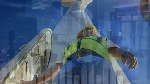 Engineer Inspecting Wind Turbine with Digital Graph Overlay