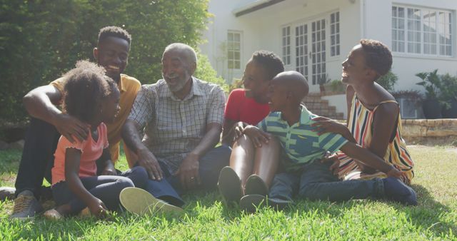 Happy Multi-Generational African American Family Sitting on Lawn - Download Free Stock Images Pikwizard.com