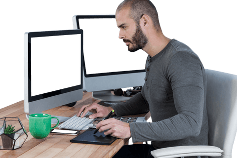Male Photographer Editing Photos with Graphic Tablet in Transparent Studio Workspace - Download Free Stock Videos Pikwizard.com