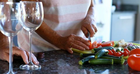 Senior Preparing Vegetables for a Special Dinner - Download Free Stock Images Pikwizard.com