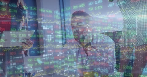 Business Team Analyzing Financial Stock Data on Screen