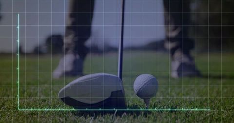 Precision driving: golfer preparing driver and ball on tee with futuristic hud overlay