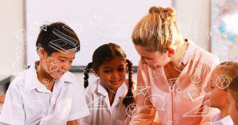 Teacher guiding elementary students collaborating at desk with hand-drawn education icons