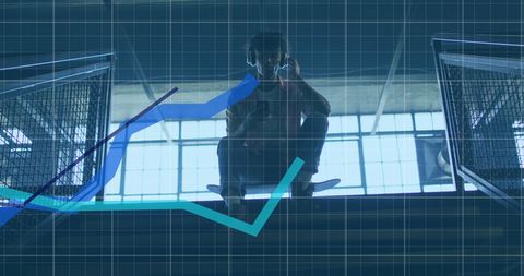 Young Man Using Smartphone with Financial Graph Overlay