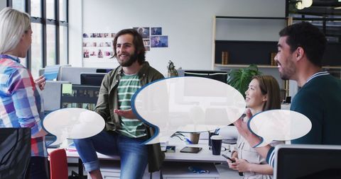 Diverse Team Engaging in Creative Business Meeting with Speech Bubbles