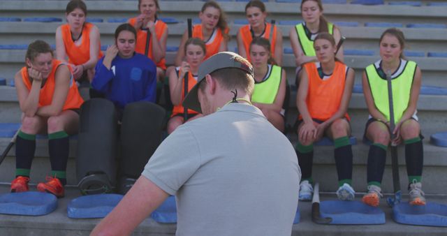 Field Hockey Team Receiving Pep Talk from Coach - Download Free Stock Images Pikwizard.com