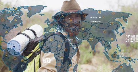 Backpacker wearing brimmed hat on arid trail with world map and digital navigation overlay