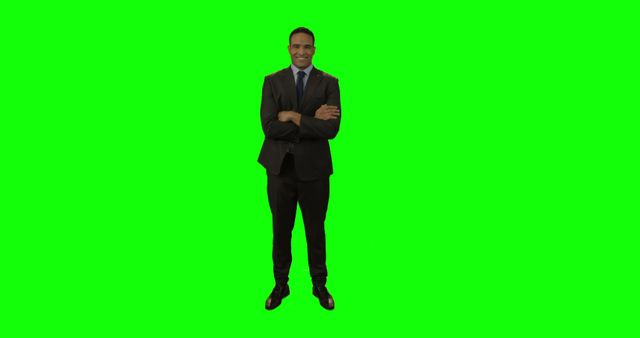 Confident Businessman Standing Against Green Screen Background - Download Free Stock Images Pikwizard.com