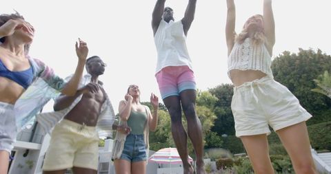 Diverse Friends Enjoying Outdoor Fun and Laughter