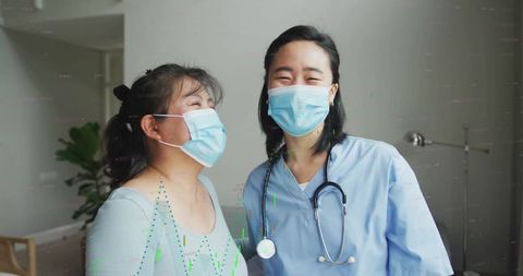 Doctor and Patient Smiling Together in Healthcare Setting