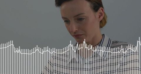 Female professional concentrating with audio waveform overlay, striped collared blouse