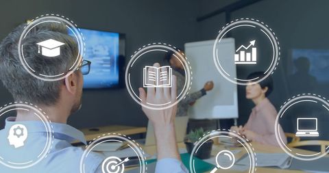 Business Icons Overlay on Team Planning in Modern Office