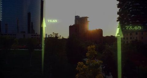 Futuristic City Sunrise Over Modern Skyline with Data Visualization