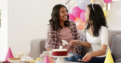 Cheerful Friends Enjoying Birthday Celebration at Home