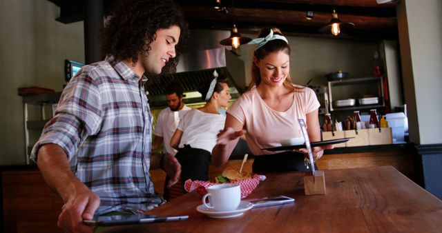 Waitress Serving Food to Customers at Cafe - Download Free Stock Images Pikwizard.com