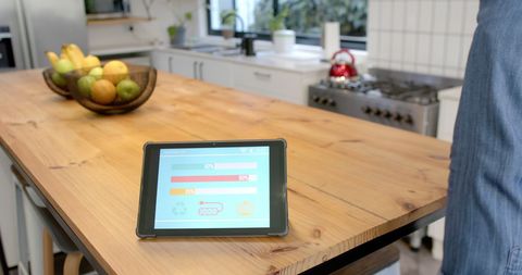 Tablet Displaying Smart Home Dashboard in Modern Kitchen - Download Free Stock Images Pikwizard.com