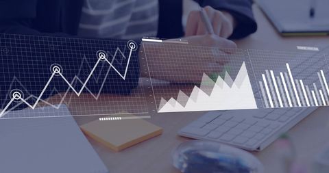 Businesswoman Analyzing Financial Data on Desk - Download Free Stock Images Pikwizard.com