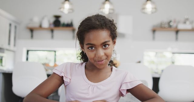 Smiling African American Girl Portrait in Modern Kitchen - Download Free Stock Images Pikwizard.com