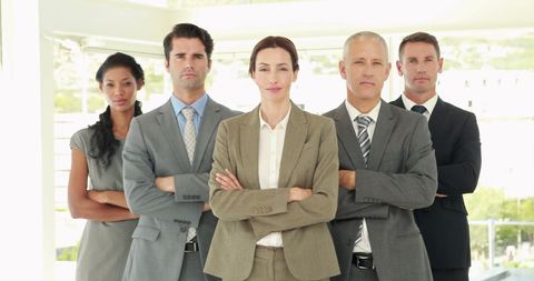 Diverse Business Team Exhibiting Confidence and Leadership - Download Free Stock Images Pikwizard.com