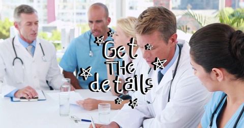 Medical doctors collaborating in hospital meeting setting