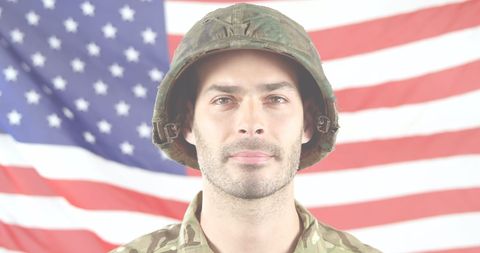 American Soldier in Uniform with USA Flag Background