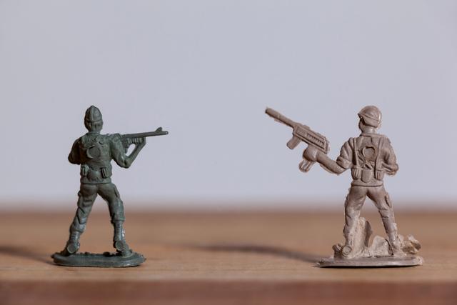 Miniature Army Soldiers in Battle Stance - Download Free Stock Photos Pikwizard.com