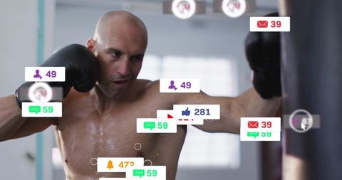 Shirtless boxer training on heavy bag with social media notifications overlay