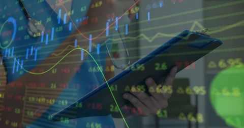 Medical professional analyzing financial data overlay