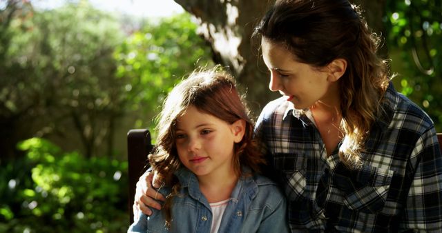 Mother Consoling Young Daughter Outdoors on Sunny Day - Download Free Stock Images Pikwizard.com