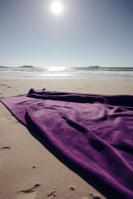 Purple towel on beach with sea and blue sky, created using generative ai technology. Seaside landscape, vacation, leisure, summer and nature concept digitally generated image.