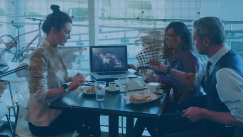 Diverse Business Team in Strategic Meeting with Digital Data Overlay