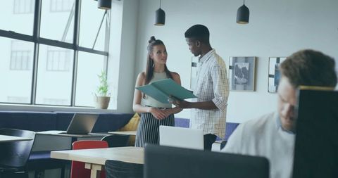 Collaborative Team Discussion in Modern Open Workspace