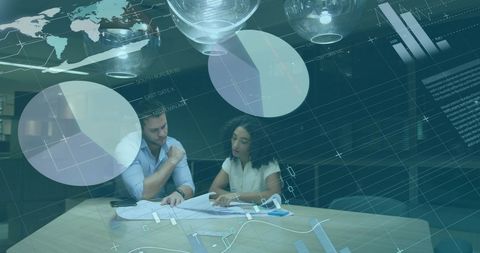 Team Analyzing Financial Data with Global Infographics in Office