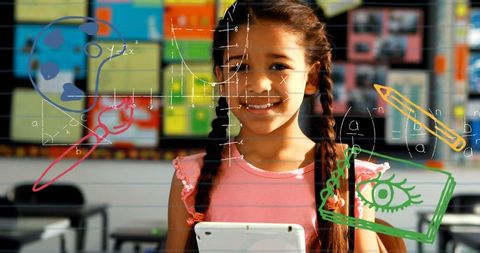 Smiling schoolgirl using tablet learning interactive concepts classroom