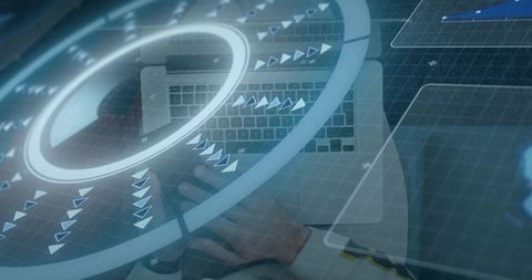 Typing Hands Navigating Laptop with Futuristic Holographic HUD Overlay and Blue Digital Grid