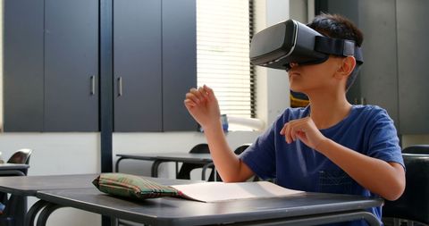 Young student exploring with vr headset in classroom environment