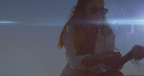 Contemplative woman exploring nature in artistic sidelight