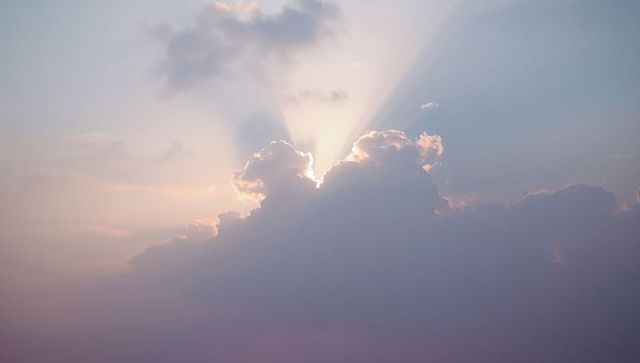 Sun Rays Breaking Through Clouds with Silver Lining