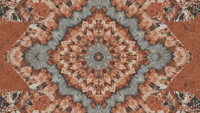 Earthy symmetrical kaleidoscopic mandala on weathered tapestry