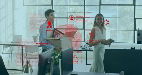 Young professionals relocating office amid red malware alerts overlaying modern workspace