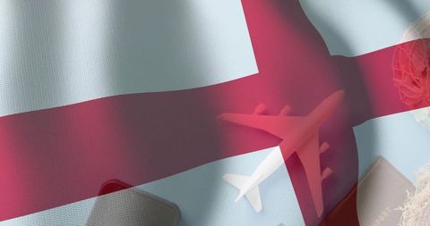 England romantic travel flat lay with st george cross flag, plane silhouettes and passport