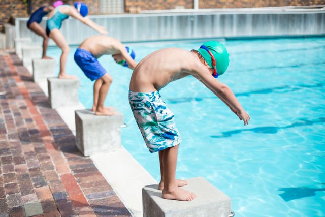 Children Preparing to Dive into Swimming Pool - Download Free Stock Photos Pikwizard.com