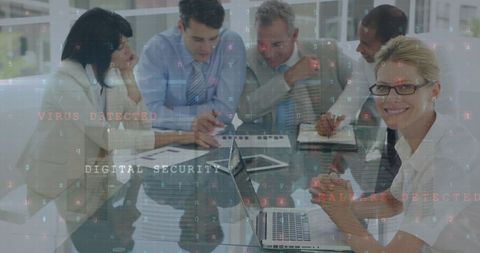 Business team discusses digital security measures in modern office