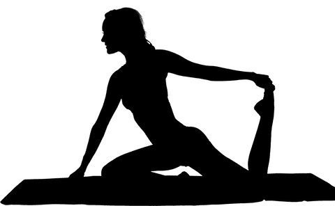 Transparent silhouette of woman practising yoga on isolated background